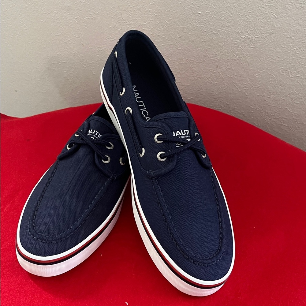 Nautica Dark Blue Canvas Boat Shoes
* 2 PAIRS* 10, 10.5M